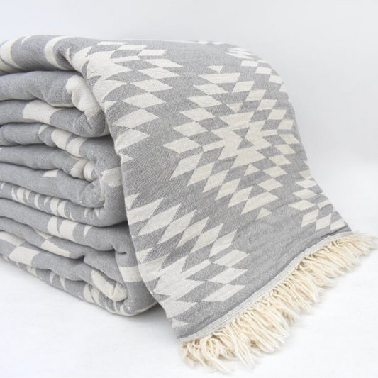 Folded soft KILIM Turkish Blankets in grey