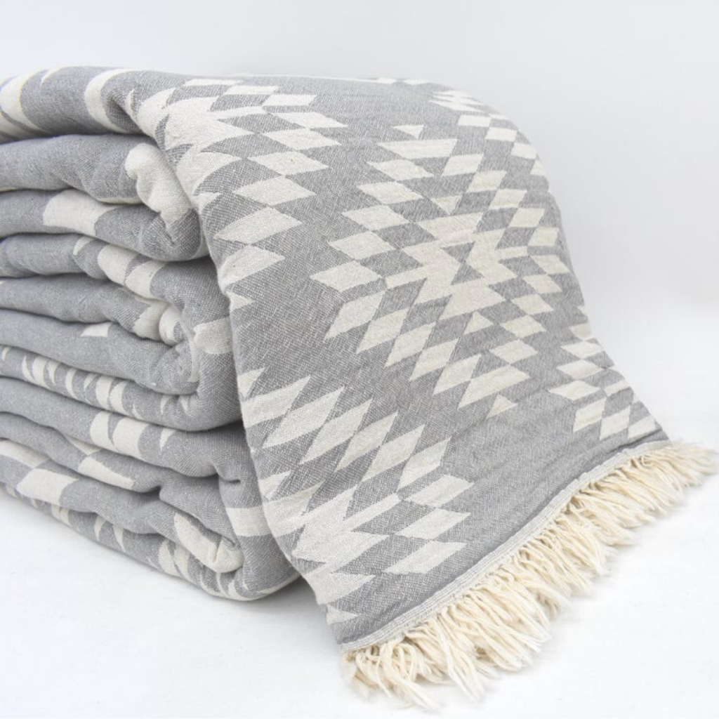 Folded soft KILIM Turkish Blankets in grey