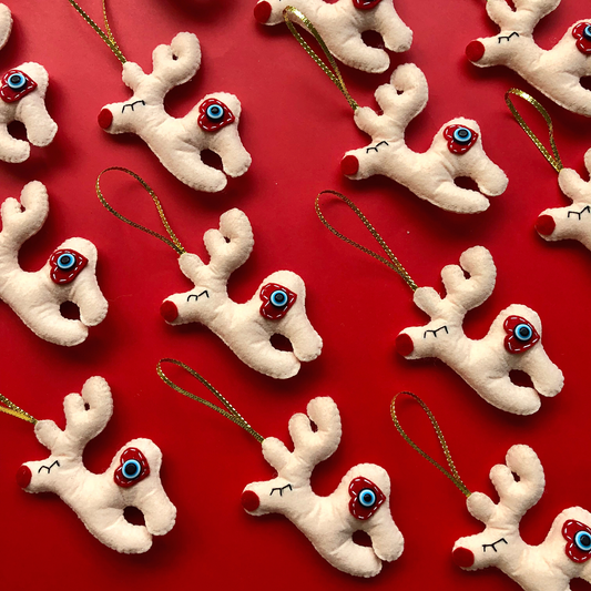 Rudolph the Red-Nosed Reindeers NAZAR Felt Christmas Ornaments on red festive background