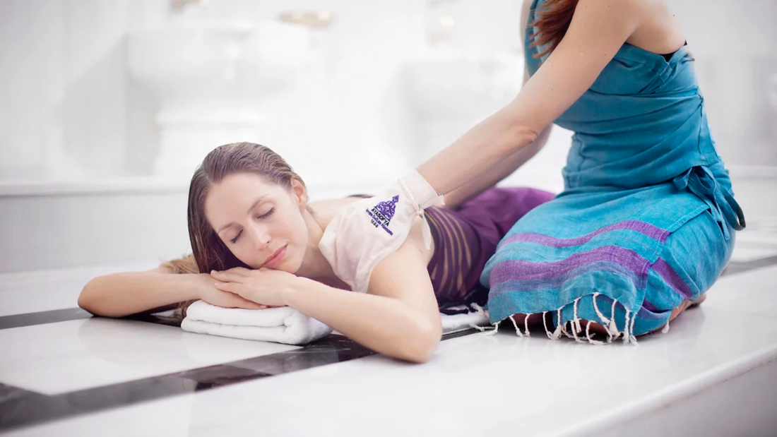 Exfoliating skin with Turkish bath mitt