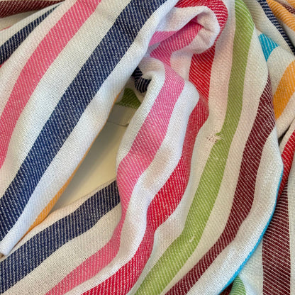Close-up of colorful striped CONFETTI Turkish Towel with red, blue, green, and white stripes.
