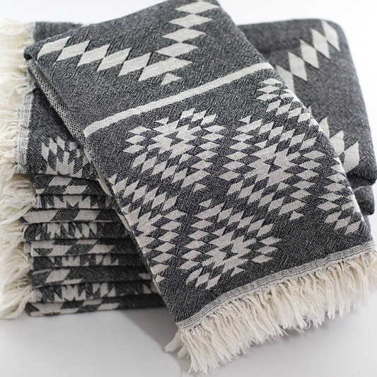 Folded mini KILIM Turkish hand towels in charcoal colour