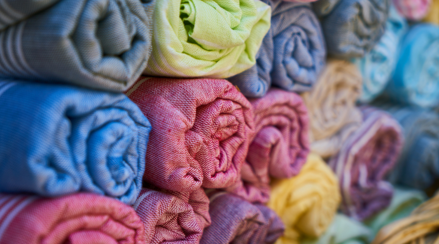Rolled up colourful Turkish bath towels
