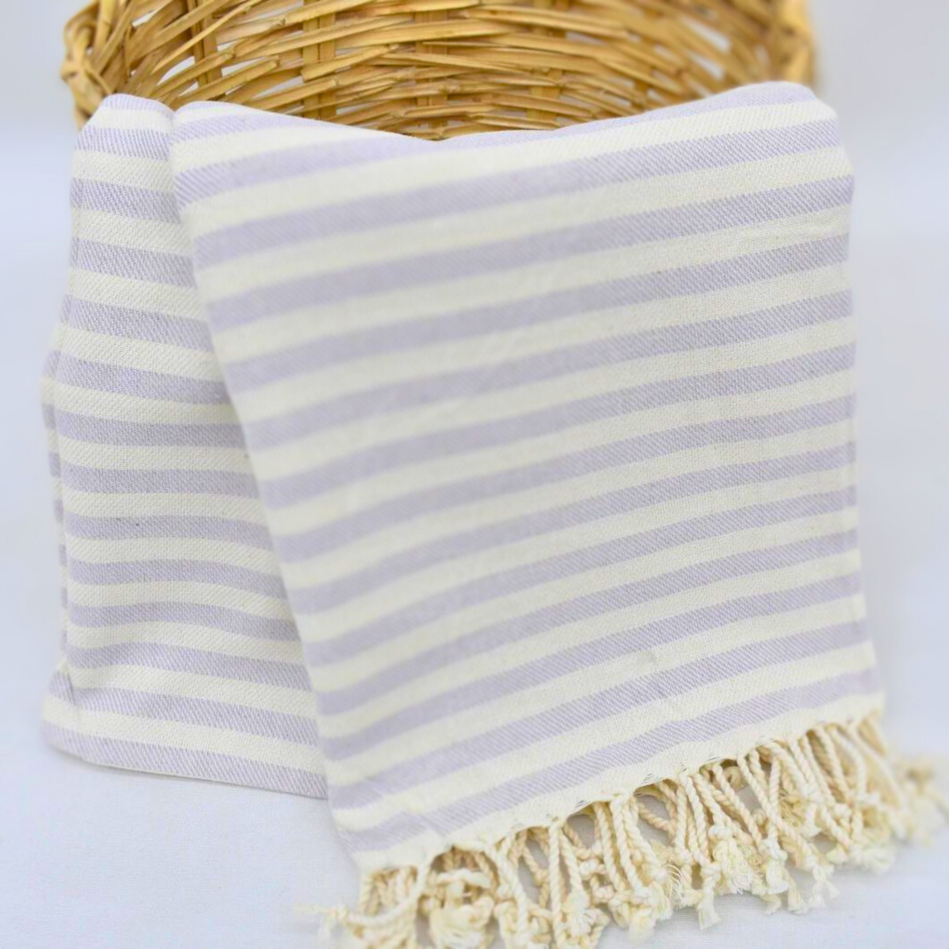 LAVENDER Turkish Towel hanging from basket