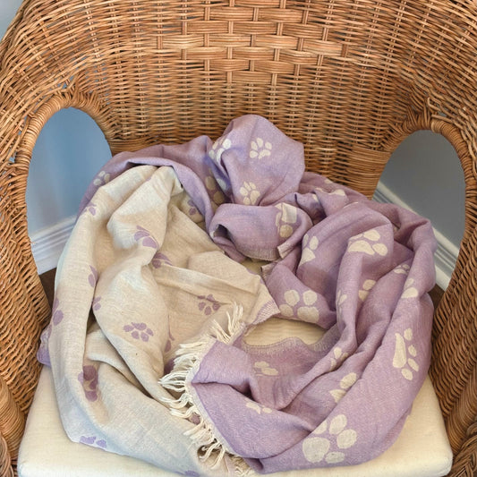 Reversible light purple and beige paws patterned Turkish towel for pets.