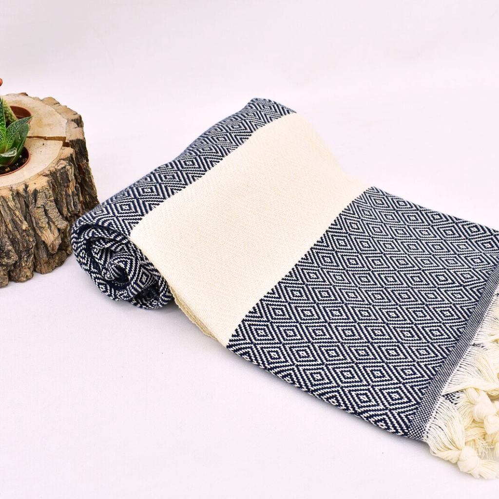 PERA Turkish Towel in navy, featuring geometric patterns and a beige stripe in the center