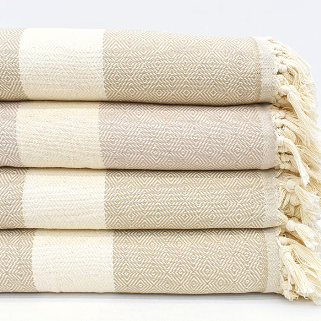 Folded beige SULTAN Blankets