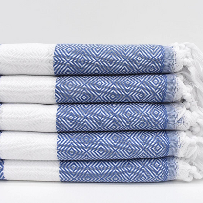 Stacked blue SULTAN Turkish Towels