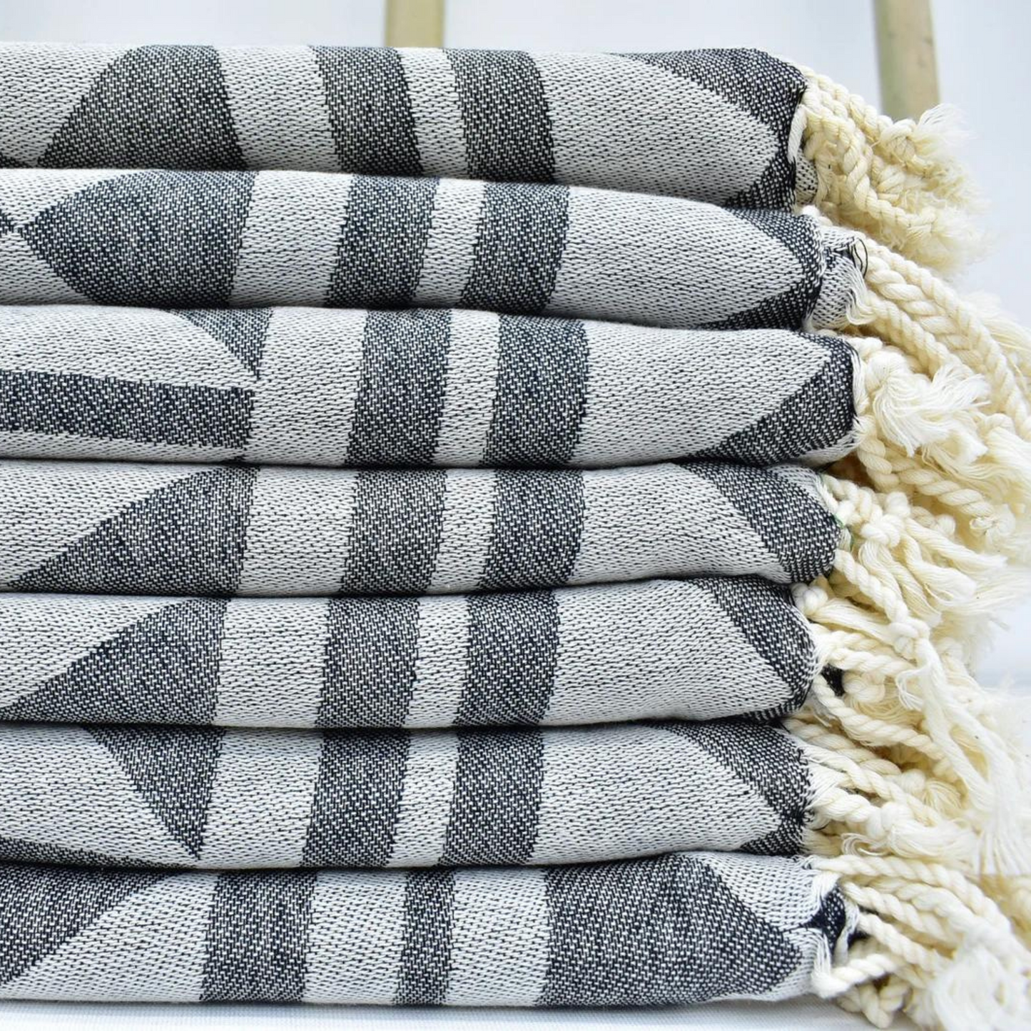 Stacked URBAN Turkish Towels with grey geometric patterns