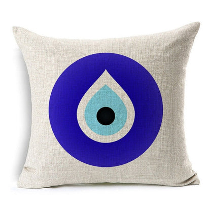 Vibrant dark blue and turquoise evil eye bead design on throw pillow