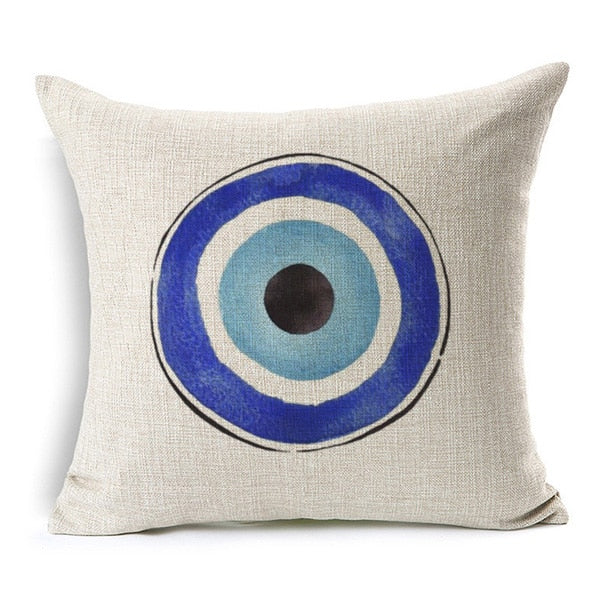 Watercolour navy and blue evil eye bead design on off-white throw cushion
